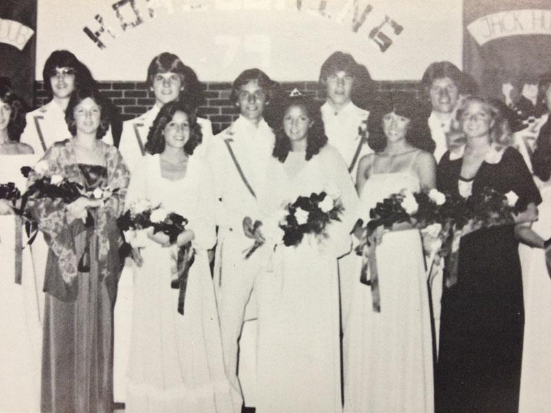 After being crowned, the 1980s homecoming court takes a picture. “I would rather go to homecoming in the 80s,” sophomore Griffin Sheridan said. “The music was better.” Most of the music played at this year’s dance was club music.
