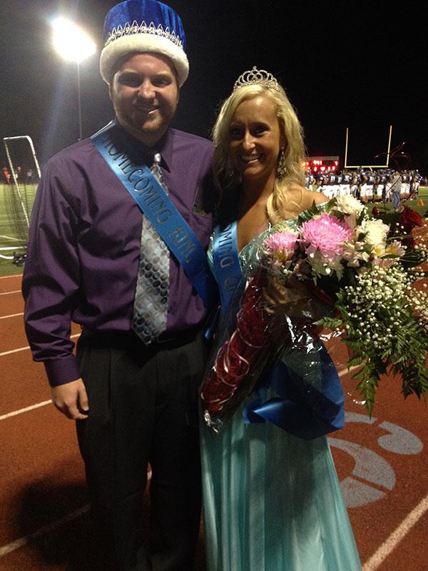 Senior Lilly Smiscik beams as homecoming queen with homecoming king senior Connor Jones.  “Being able to be homecoming queen and my boyfriend being homecoming king is a dream come true,” Smiscik said. “I’m so overwhelmed and excited.”  After she was announced queen, the Varsity Dance members ran on the field to congratulate her.