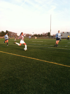 During the first half, senior outside defender Taylor Kastens crosses the ball into the 18 yard box.