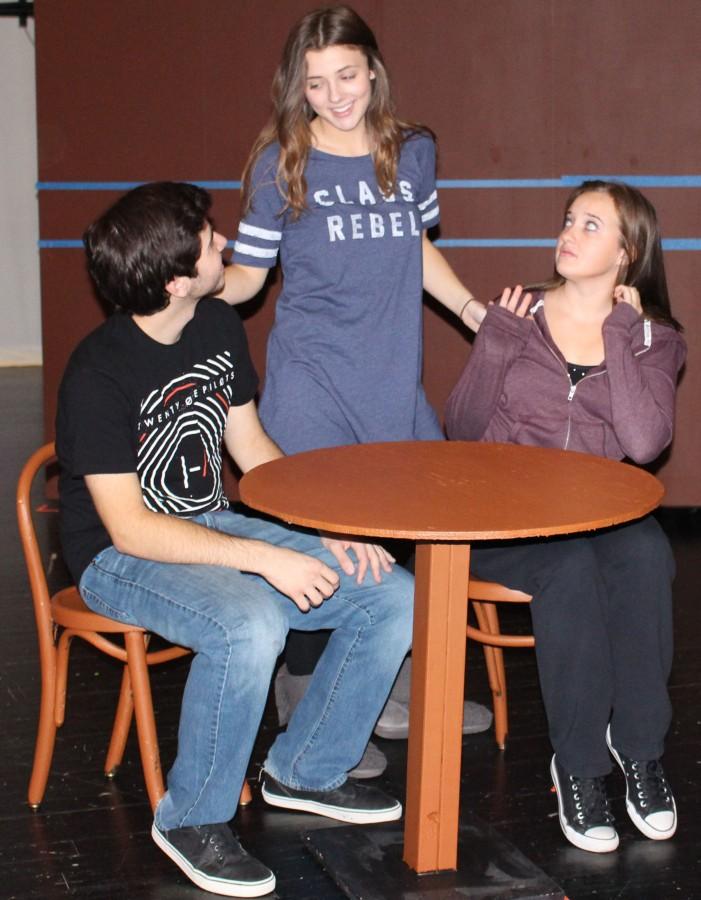 Senior actors Tommy Randazzo, Kaitlyn Meyers and Kaitlyn Cody practice their scene “Sad and Glad.” “I’m excited for everyone to see the different emotions we can display,” Randazzo said. Opening night was Friday, Nov. 20 at 7 p.m.
