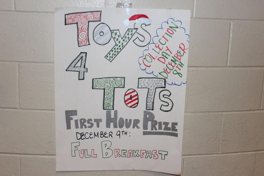 StuCo made Toys for Tots posters, like these, to show what the students could win. “I think the Tigers tickets are always the most wanted,” Bronson said. These posters are hung around the school to advertise the prizes available.