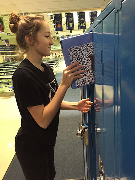 Sophomore Kendra McCabe, is switching out her binders before the new semester begins. I am so eager to begin my new classes. It is so exciting seeing all the new people in my class, said McCabe. Cleaning her binders out helps her get a new start on the new semester. 