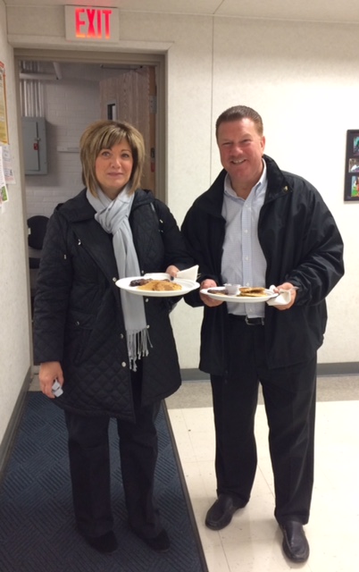 State Representative Peter Lucido and his wife Anne Marie pose for a picture before eating their pancakes.