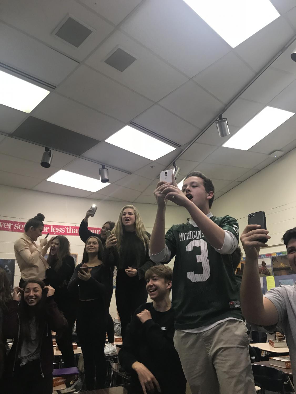 As the results comes in, Holly Kralik’s class cheers as they see they have won the fifth hour telethon prize.