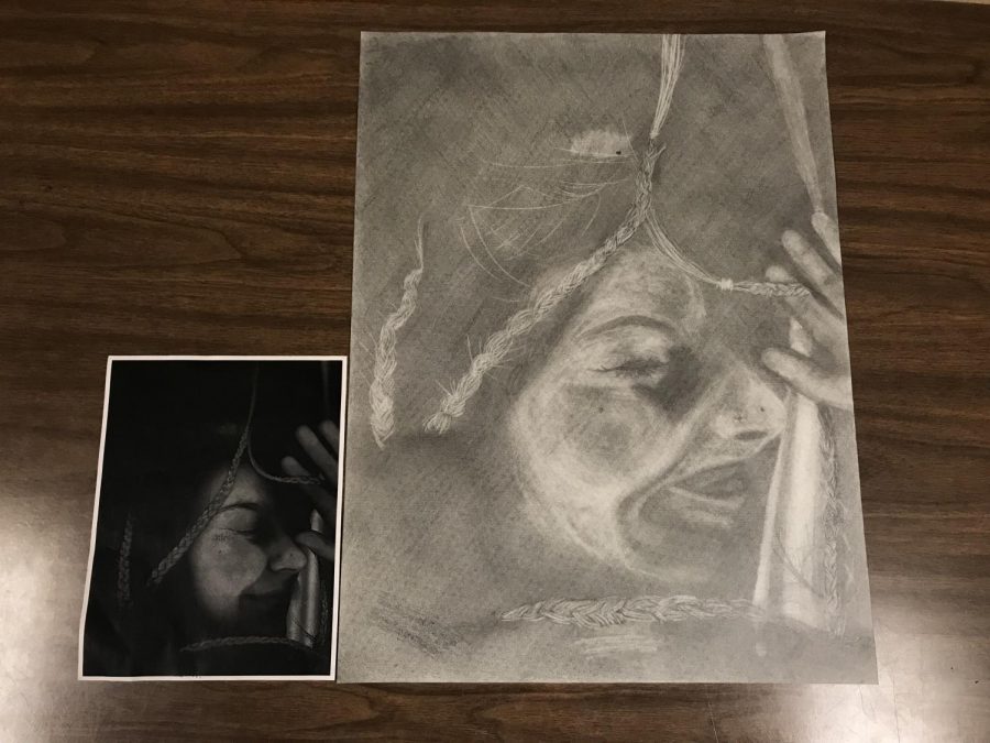 Junior art student Tiffany Myers’s project for “Trapped”.