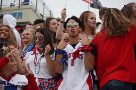 The student section at the Chippewa game shows their game day spirit.
