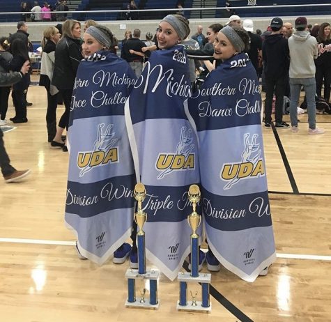 Kayleigh Messina, right, at the UDA Southern Michigan Regional competition alongside teammates Emma Leykauf, left, and Emma Seaglund, center.