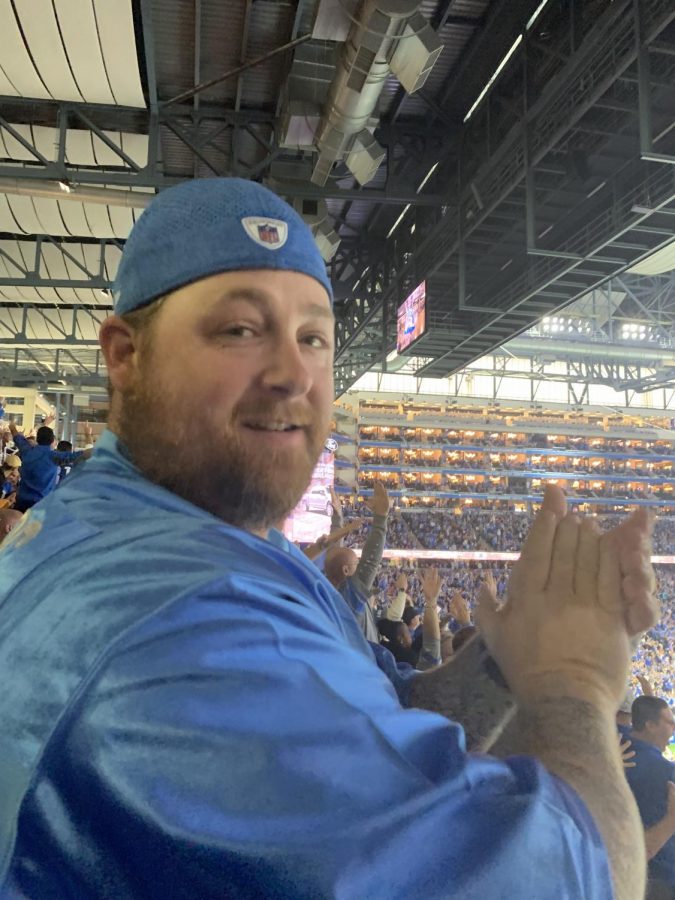 As he smiles from the play, Eric Stacey looks to his wife and kids. “I was really glad the Lions made this play and increased our lead over the Chiefs,” he said. After this photo was taken, he sat back down and watched the rest of the game. 
