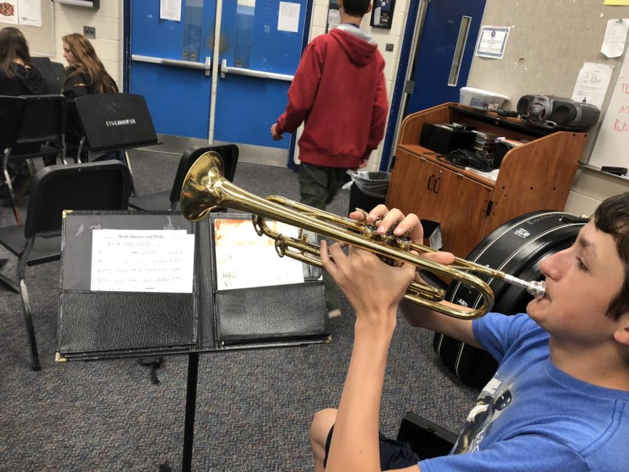 For his upcoming test in band sophomore Brian Howick prepares to play his trumpet. Before the test he prepares by doing lip slurs. “The tests usually don’t stress me out since I prepare.” Howick said.
