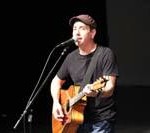
Presenting to the student audience, Dennis Liegghio performs a song relating to his personal experience with suicide. Many found this impactful. “It definitely has a positive effect on the student body,” counselor Jennifer Kretschmer said.
