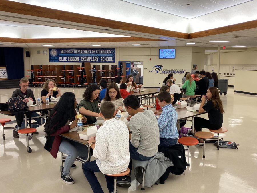 While the French students enjoy a catered dinner at Malow Jr. High, they also take the time to talk with their peers. Some of the older students thought it was exciting to see the next group of kids. “[My favorite part was] seeing some of the other french students from here and the next generation of French students,” sophomore Mina Metzler said. 
