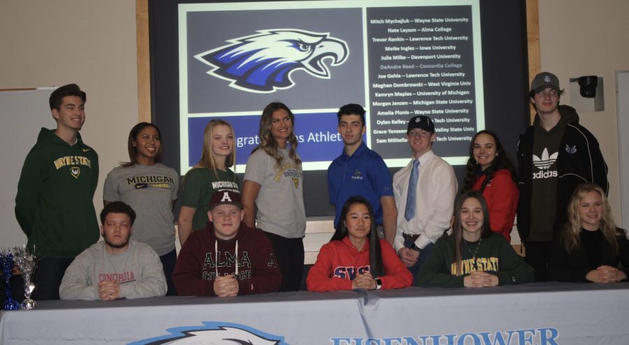 Students+Athletes+celebrate+their+skill+and+sign+to+college+at+the+signing+celebration+Dec.+18.+