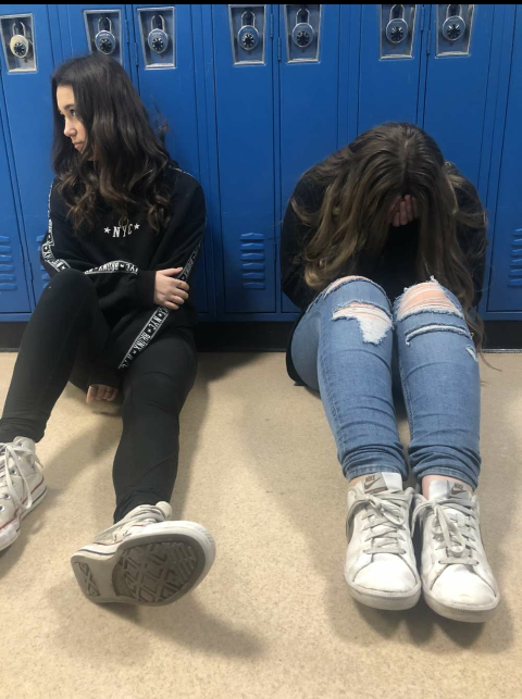 Sophomores+Ashley+Reiff+and+Melina+Ianucci+feel+stressed+out+after+a+long+day+at+school.