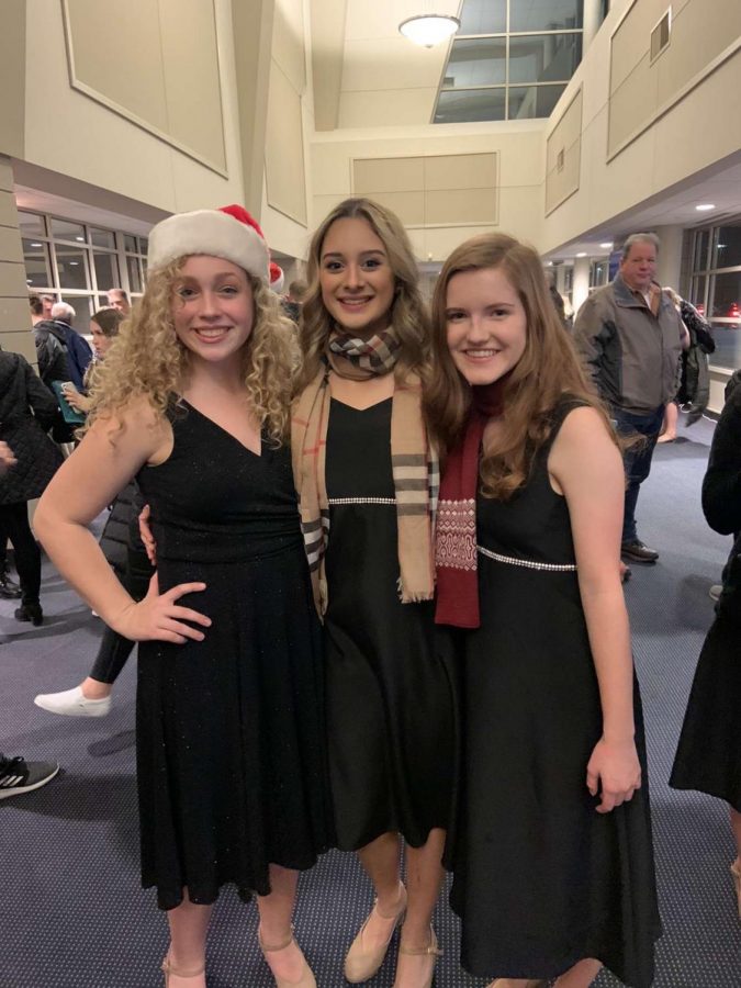 After finishing their choir concert, junior Isabella Cole stands with her friends junior Jamie Greenwood and sophomore Hailey Nichols.  “She was very nice and she was always so outgoing. I’m pretty sure that’s why we became friends,” Jamie Greenwood said. Cole continued to be an active member of the choir with her friends.