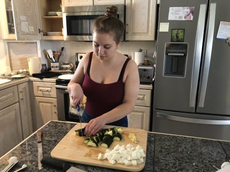 I cut up two zucchinis on May 20 to go with dinner that night. My mom asked me to help her with dinner, so I did—chopping up zucchini and mild Italian sausage for us to mix together with red bell pepper, onions, garlic and noodles with a butter sauce. Spoiler: it was delicious!