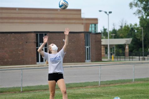 Reese Binando spikes the volleyball at tryouts in August. MHSAA decided that volleyball is one of the sports able to have a season this fall.