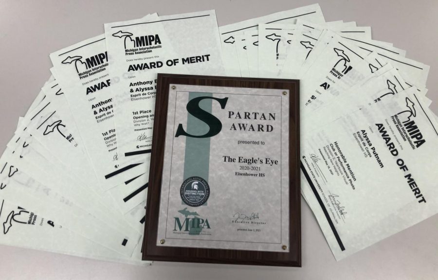 The+Michigan+Interscholastic+Press+Association+winning+staff+earns+a+Spartan+plaque+and+certificates+for+individuals.