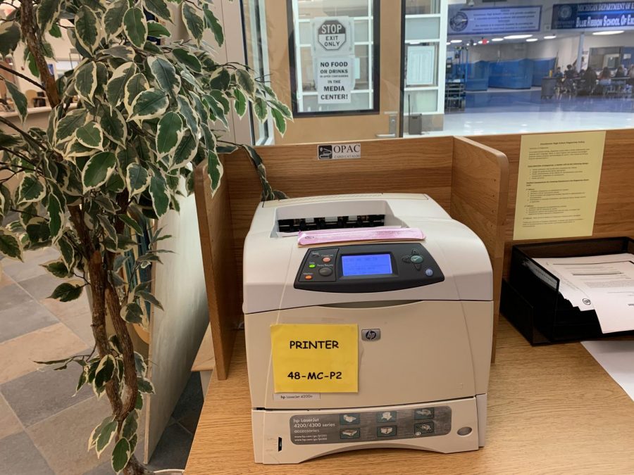  Majority of the papers printed by students go to this printer. “I think for some people it is easier to remember stuff when you physically write it down,” sophomore Grace Shutter said. Most of the papers were thrown out shortly after being printed. 

