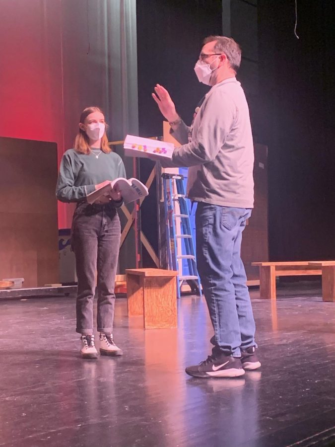 Directing the actors, theater director Eric Wells assists the cast with learning their lines. “It’s a fun show. I’m just looking forward to the reactions of the audience to all the quirky characters,” Wells said. They rehearsed Mamma Mia, which  premiers on March 4
