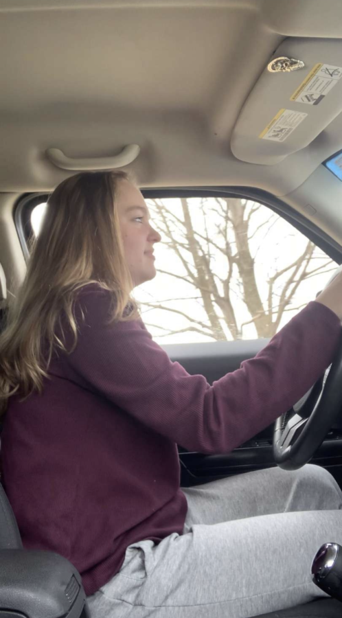 Driving craze! Junior Kaitlyn Mulville drives home from school. She felt safe and relaxed. “I would be upset [if I had to wait until 18 years old to drive alone], because when I drive I feel very calm and free, and I wouldn’t want to rely on others to drive me around,” Mulville said.