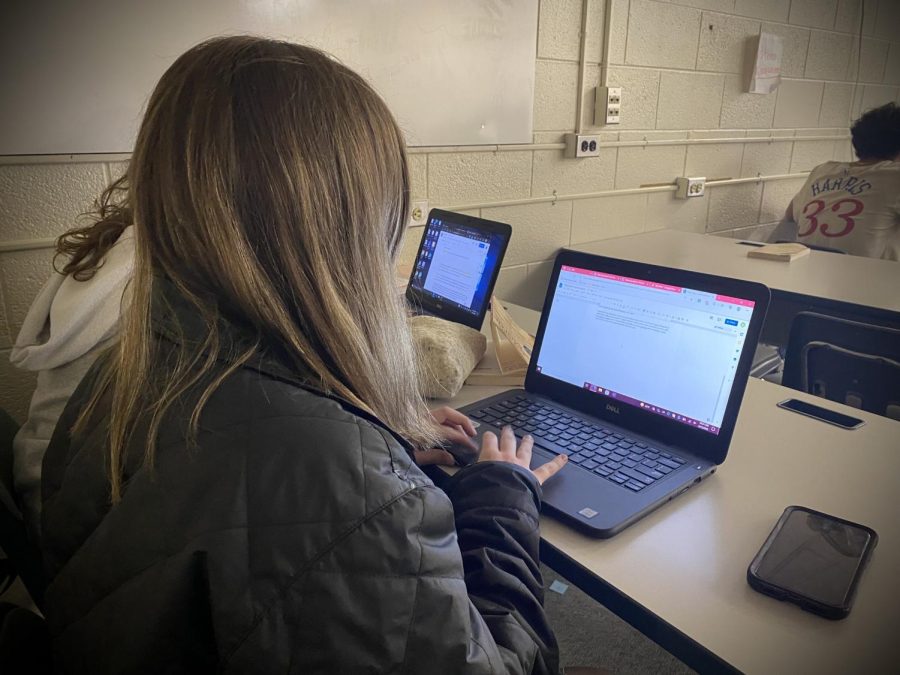 Junior Kendall Culpert uses her school-assigned laptop. 