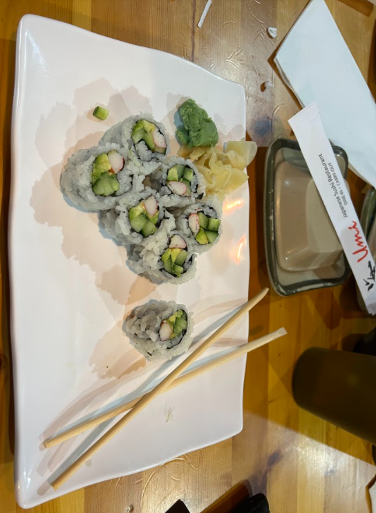 Students try the California roll and other sushi for the first time at Umi sushi. 