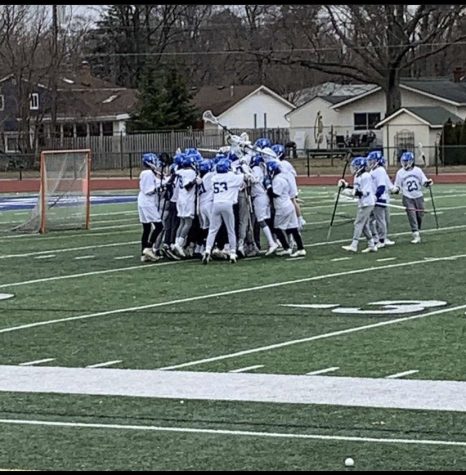  The Utica and Eisenhower players are celebrating their second win of the season against Anchor Bay High School. “It was a good game,” said senior defensive pole and midfielder Jacob Razook. “We’ve got a good group of guys and I’d say the merging is doing us very well.” The lacrosse team still has a long season ahead of them. 
