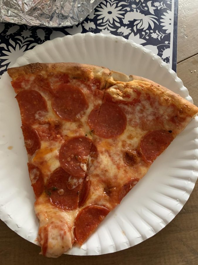 Pictured is a slice of pizza from Vincent Joes Gourmet Market.