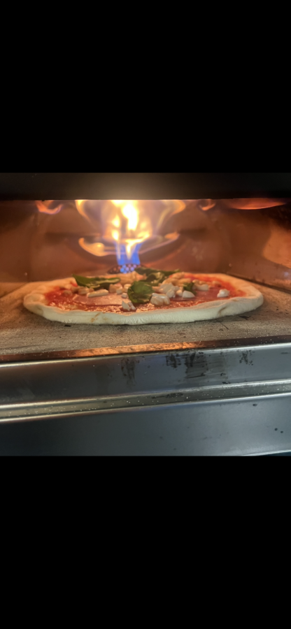 Hot+N%E2%80%99+Ready-+The+homemade+pizza+slowly+cooks+in+the+oven.+In+comparison+to+the+Little+Cesar%E2%80%99s+Hot+N%E2%80%99+Ready%2C+the+homemade+pizza+came+out+on+top.%0A