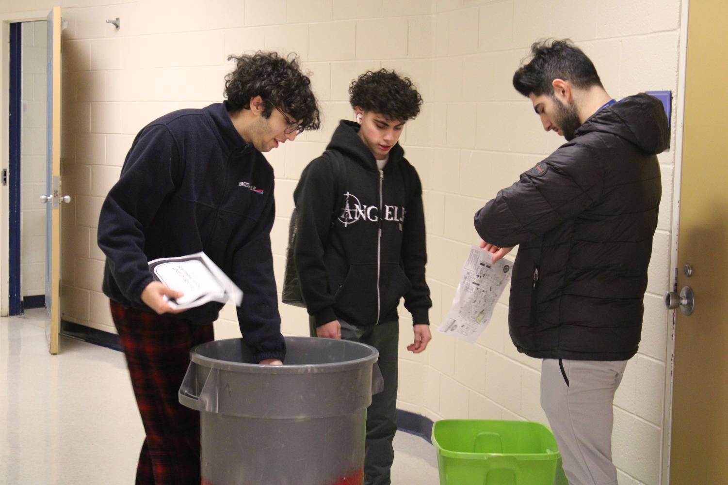 Resolutely recycling. Members of the environmental club participate in recycling around the school. This was only one of the many programs the club upheld to better the school and community.
