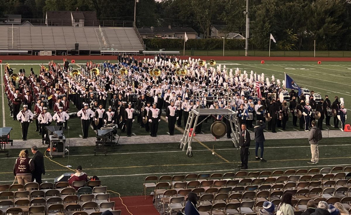 March+to+the+beat.+Marching+band+performs+their+%E2%80%9CThe+Time+is+Now%E2%80%9D+themed+performance+at+Band-A-Rama.+The+106+members+took+the+spotlight+Sunday%2C+Oct.+8.