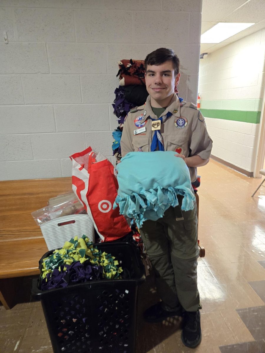 Dedication and hard work. Eagle Scout Kyle Dawson gives away dog blankets to the community.
