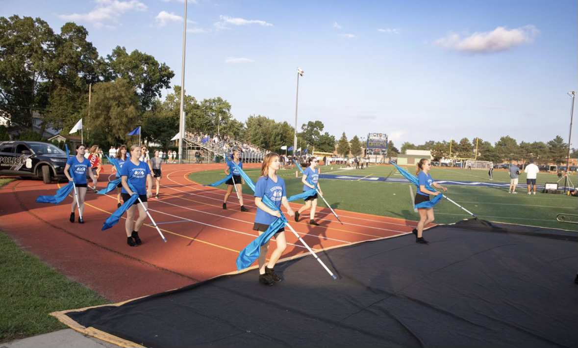  Born to fly. Color guard practices their routines at the summer band camp in August. The team focused on their time management and communication to eliminate any flaws in their performance.
