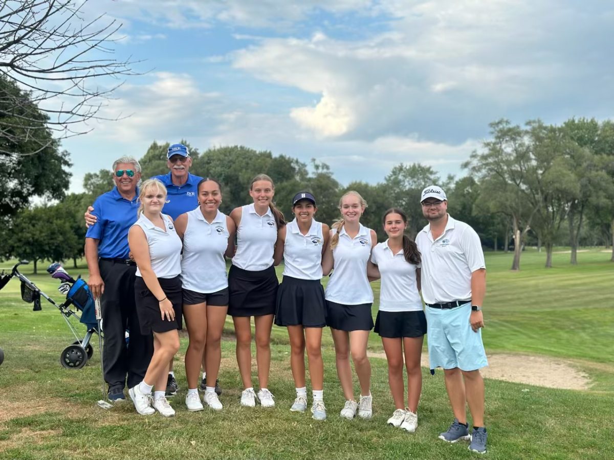 After they won their match against Stevenson, the womens varsity golf team celebrates their record of 2-2. "[My favorite part about coaching is] helping the golfers get better and when they get better, they enjoy the game more. When they enjoy the game more, that's when the real magic happens in the game," coach Douglass Hartley said. The team saw an increase in both players and skill this year.