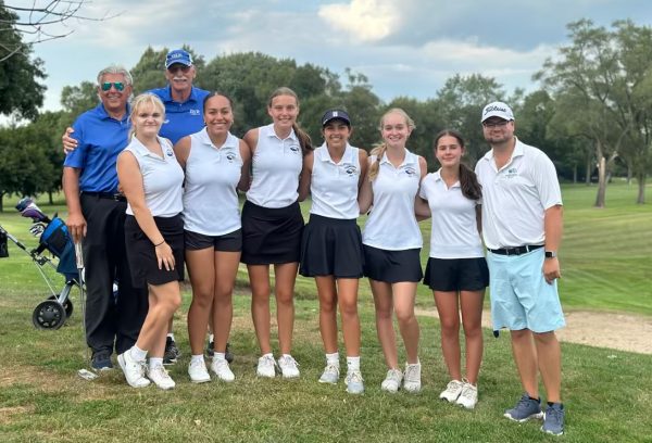 After they won their match against Stevenson, the womens varsity golf team celebrates their record of 2-2. "[My favorite part about coaching is] helping the golfers get better and when they get better, they enjoy the game more. When they enjoy the game more, that's when the real magic happens in the game," coach Douglass Hartley said. The team saw an increase in both players and skill this year.