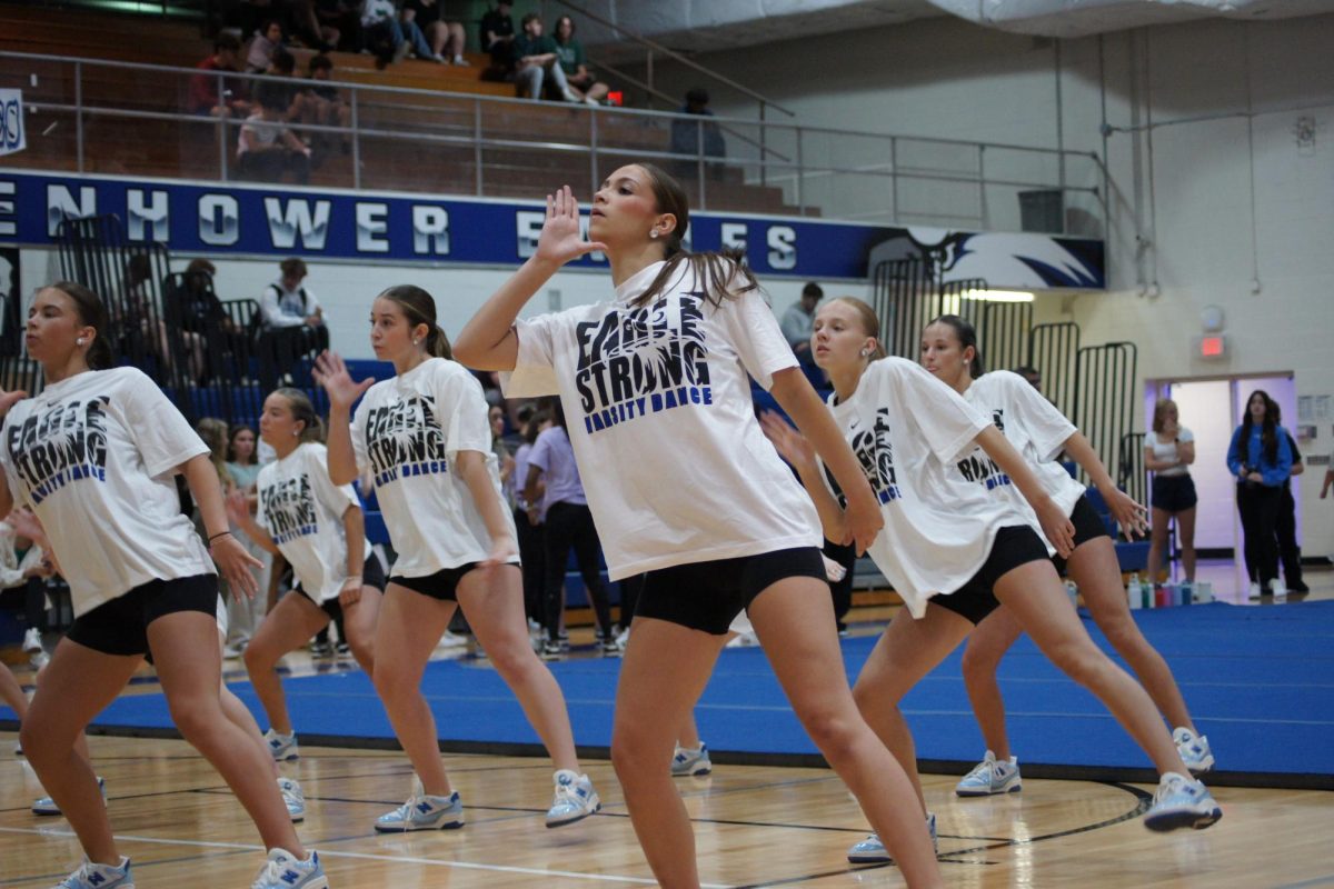 Senior Lily Giacobbe and her teammates rehearse in preparation for a pep assembly. "One thing Ike dance has taught me is to never have any regrets, no matter what happens don't live with the regret that you could've done better or used more of your potential," she said. 