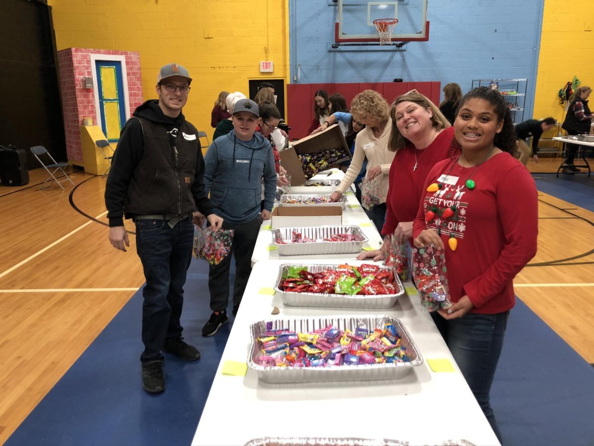  In the first station of the process, volunteers assemble the candy. “The holidays are a reminder of the importance of spreading kindness and compassion to others that should be shared throughout the whole year,” co-chair of Centric Solutions Group Cynthia Karrandja said. In 2023, the group collected $4,300 worth of Christmas treat bags.