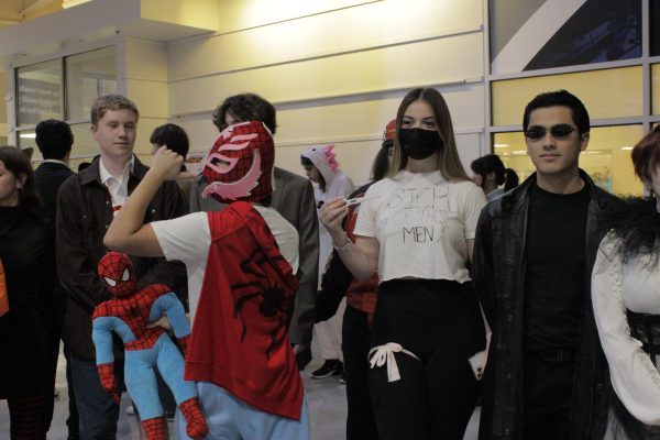 School Spirit is infectious as seniors Lennon Lee (Left) and Leonora Ljuljdjuraj (Right) sport their creative costumes. “I love Spiderman, so it was an easy choice.” Lennon Lee said.
