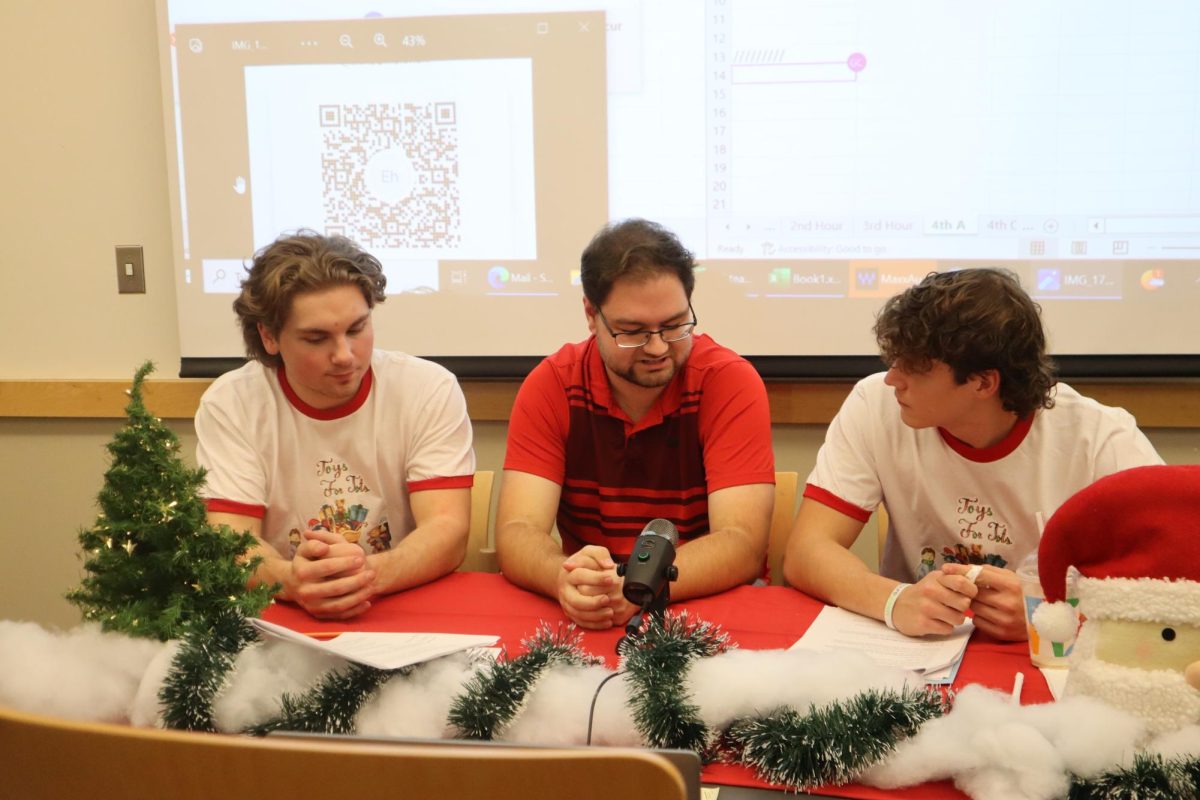 Last year, teacher Douglass Hartley appears on the telethon with student hosts. This year, the hosts will be seniors Olivia Sinishtaj and Michael Dziadula.