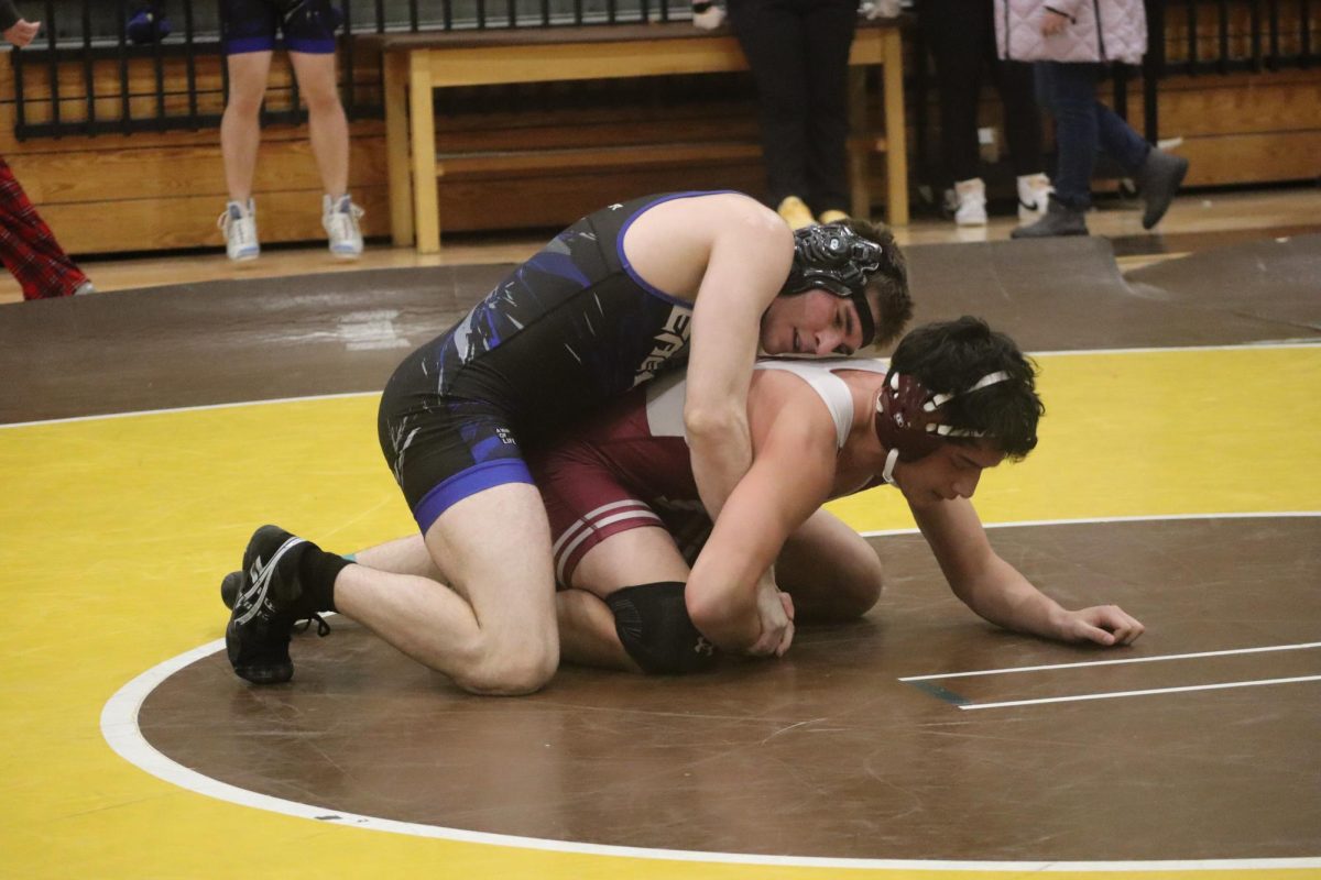 Looking for wrist control, senior  Elijah Halbert gains on his opponent. “I started wrestling because I was interested in MMA and it teaches me life skills,” Halbert said. He has wrestled for three years. 

