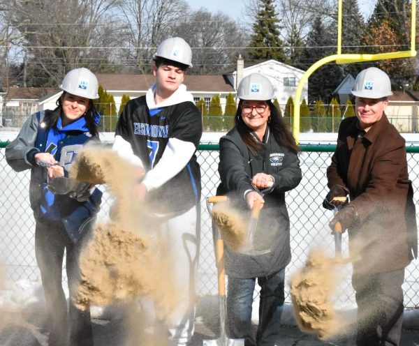 On Wednesday, Jan. 29 principal Brandon Manzella along with student representatives, seniors Luke Masternardi and Isabella Standlick participate in the Swinehart field groundbreaking ceremony. They shoveled up dirt in front of Swinehart field and threw it up to symbolize the stadiums new beginning.