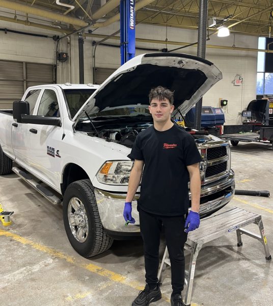 In the auto shop, senior Blaise Serate works on his truck. Despite only being a teenager, Serate does all modifications and fixes himself with the occasional help from his teacher Jeffrey Kment. “I’ve always really liked cars and trucks so as I got older that interest stuck and here we are now,” Serate said.