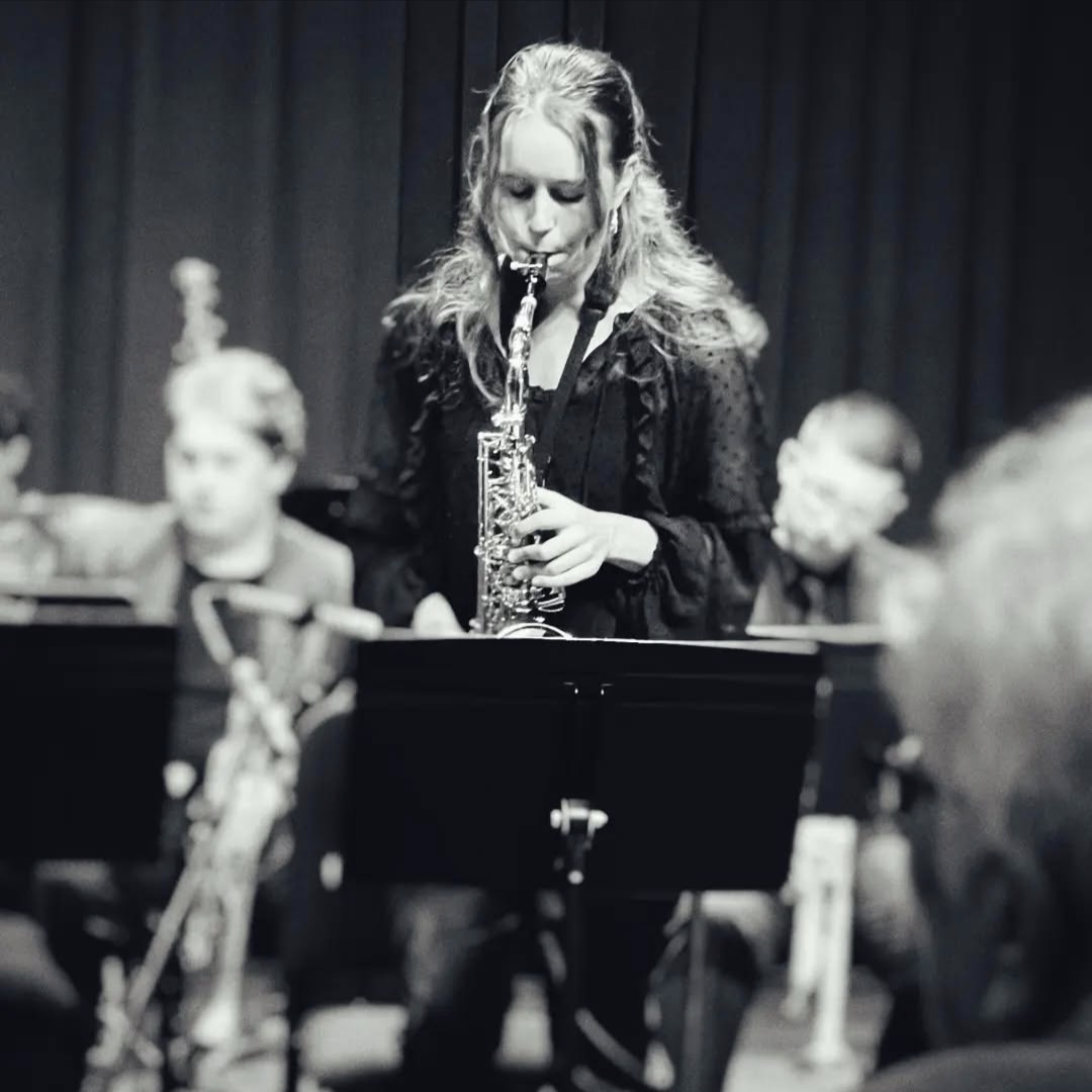 Preforming on stage, senior Helen Kangas plays the saxophone with her civic jazz orchestra team. "I feel really happy when we're playing, Especially as a senior we're playing more emotional music," Kangas said.  She has playing jazz for two years.