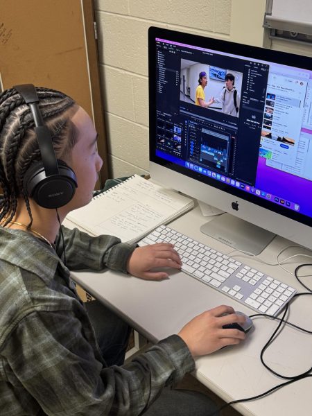 Editing together memories to end the high school adventure, senior advanced film student senior Lennon Lee and classmates dedicate time to create a senior class video. Students spent the year filming events and final words from seniors to remember the year and share on the last day.