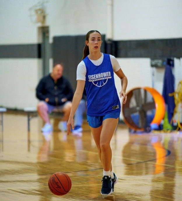 During fall ball, sophomore Leah Poggiolo dribbles on the court.  “My love for basketball motivated me to start playing,” Poggiolo said.